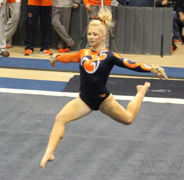 In the 2015 Orange and Blue Exhibition, Erin Buchanan executes a double stag jump doing her performance on floor exercise.